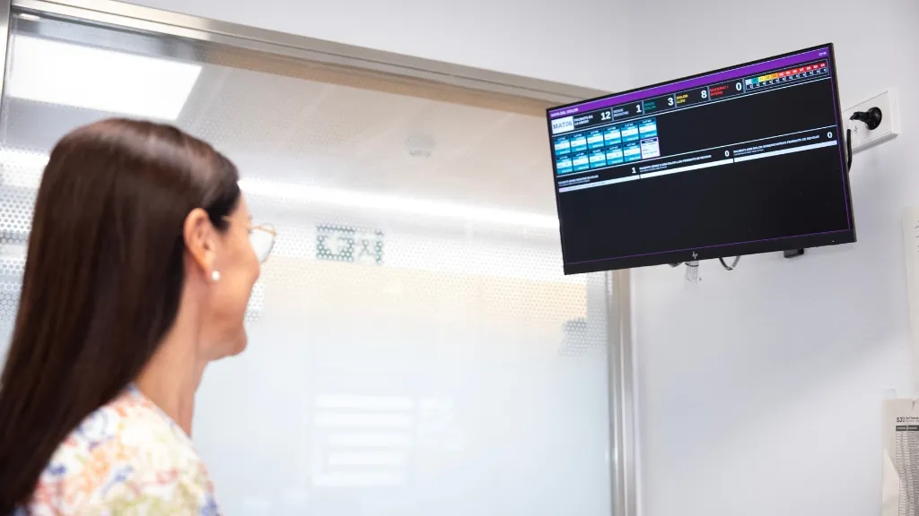 Nurse checking the pain map indicators - SJD Barcelona Children's Hospital Nurse checking the pain map indicators - SJD Barcelona Children's Hospital