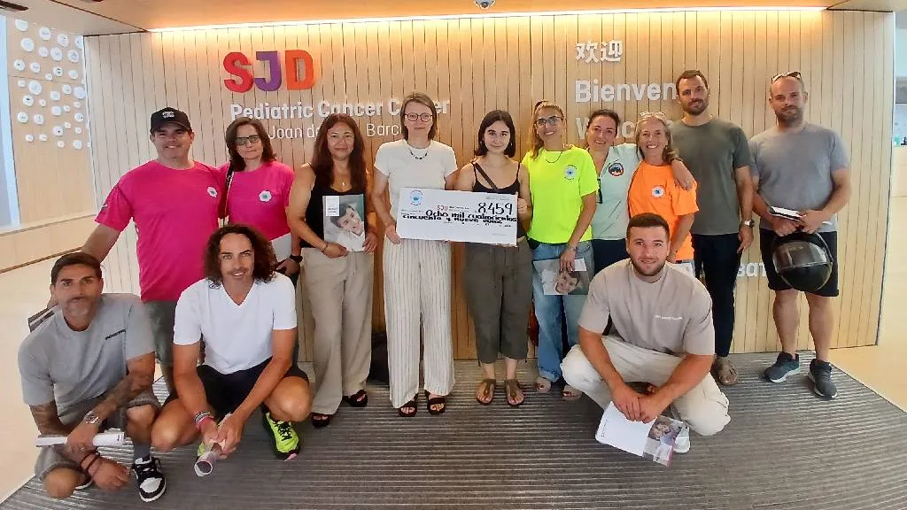 Los estibadores de Barcelona hacen entrega de la donación en Sant Joan de Déu Los estibadores de Barcelona hacen entrega de la donación en Sant Joan de Déu