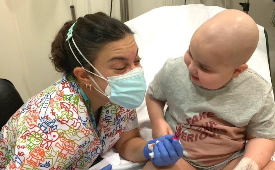 Oncological patient with a nurse in the SJD Barcelona Children's Hospital