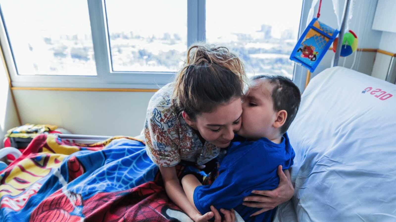 Nurse with patient at the SJD Barcelona Children's Hospital