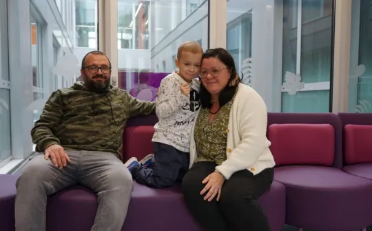 Nico Furtuna with his parents at SJD Pediatric Cancer Center Barcelona