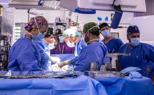 SJD surgical team during the operation on an infant with a double pathology