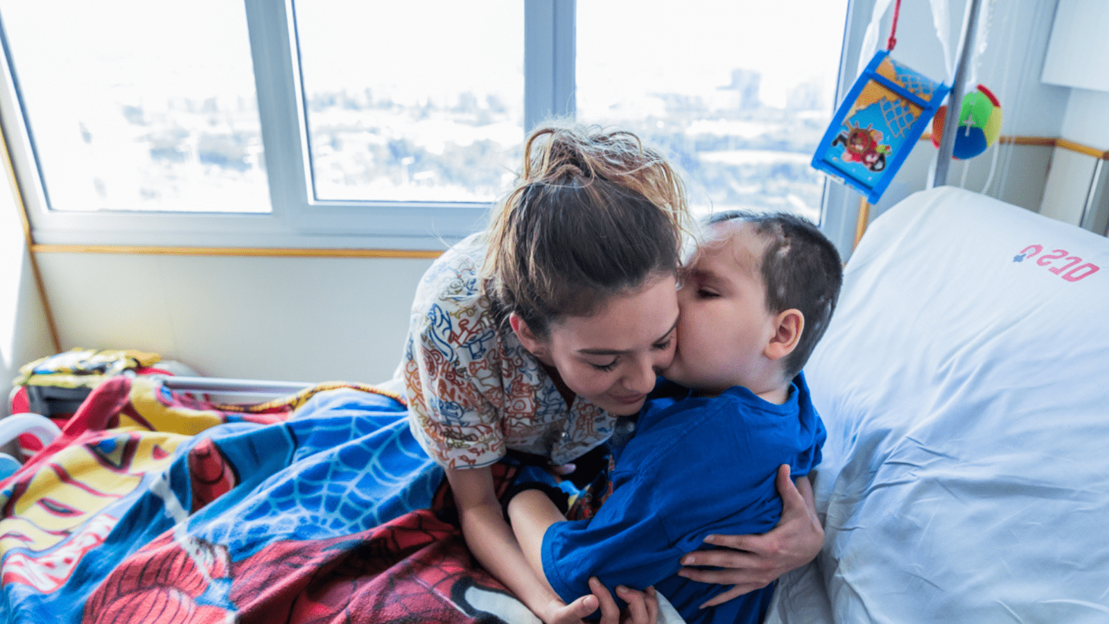Nurse with patient at the SJD Barcelona Children's Hospital Nurse with patient at the SJD Barcelona Children's Hospital