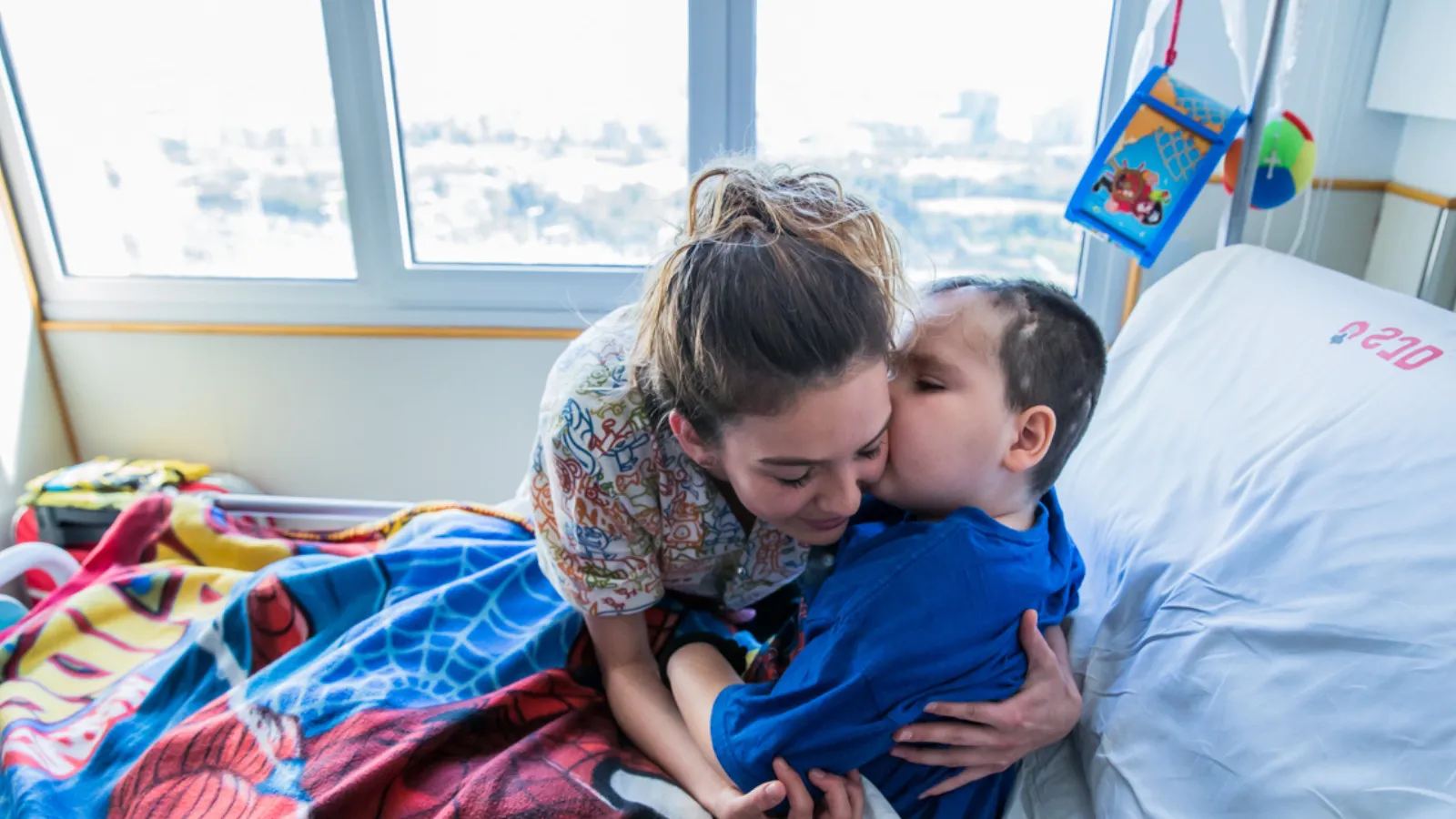 Nurse with patient at the SJD Barcelona Children's Hospital Nurse with patient at the SJD Barcelona Children's Hospital