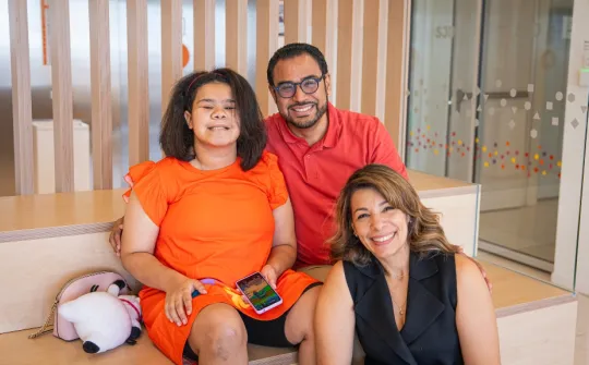 Adriana and her parents at SJD Barcelona Adriana, a patient from the Dominican Republic, SJD Barcelona